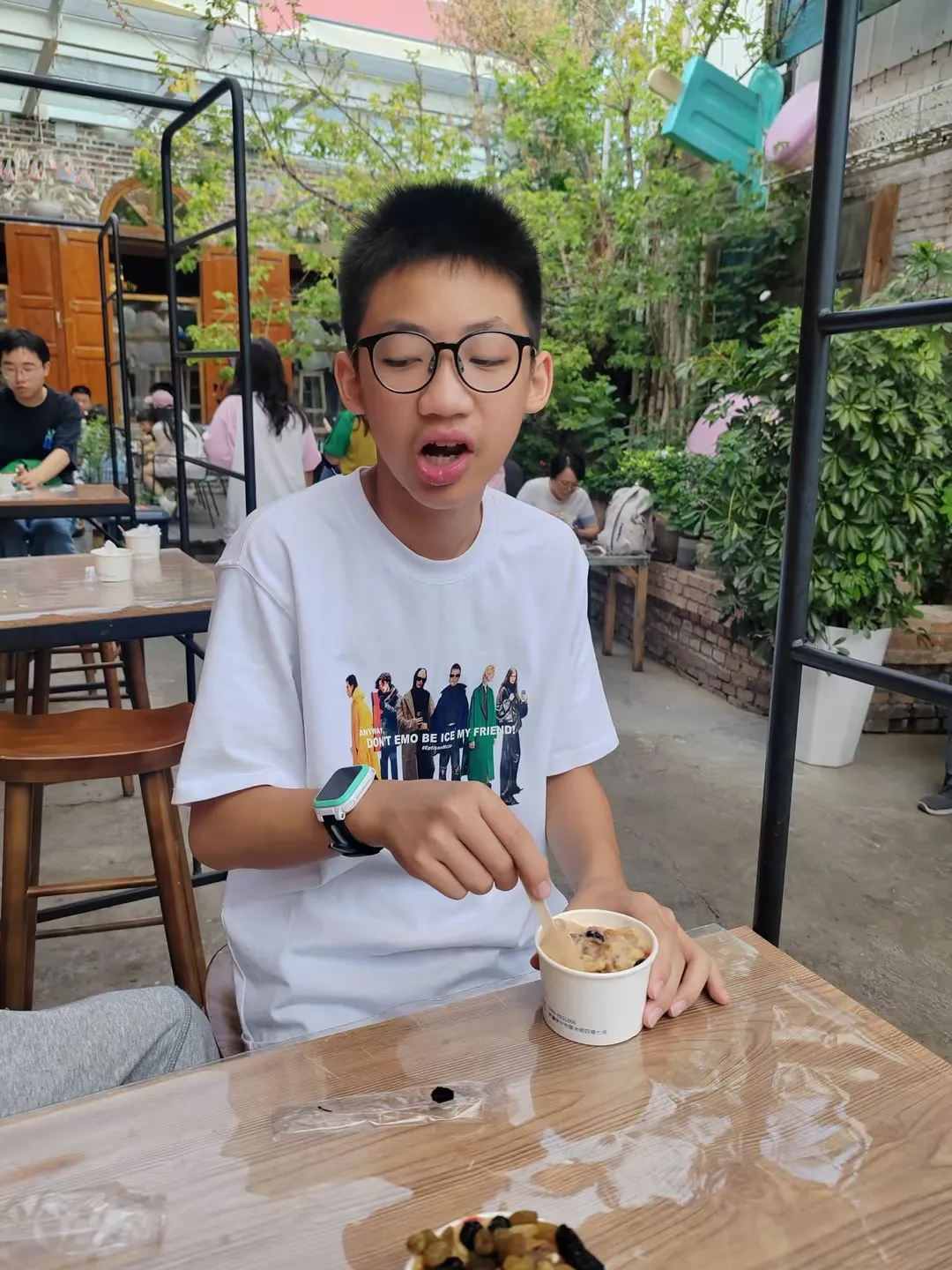 Singaporean tourists enjoying local desserts in Yining