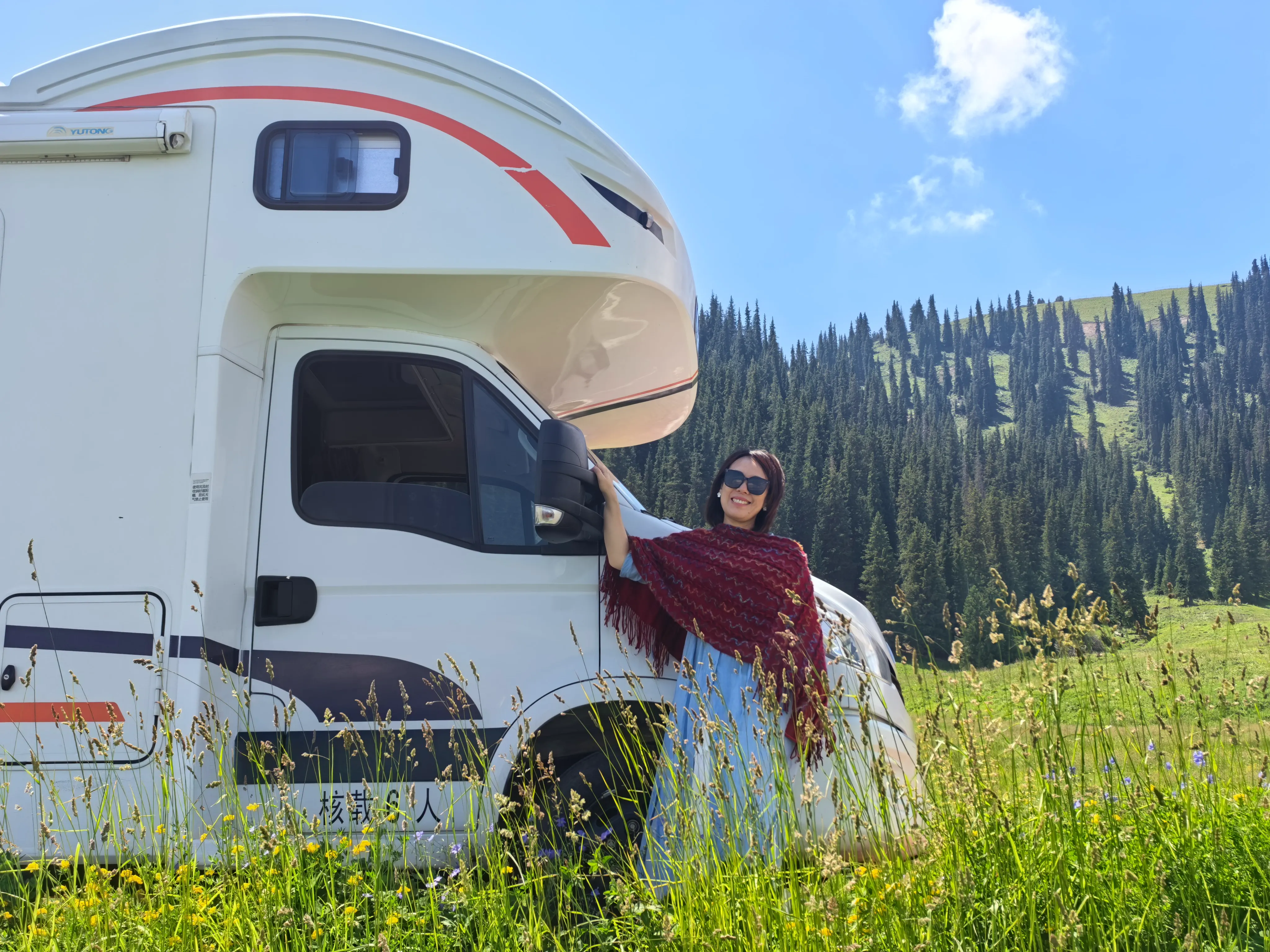 Singaporean tourists take a rest by the roadside in their RV