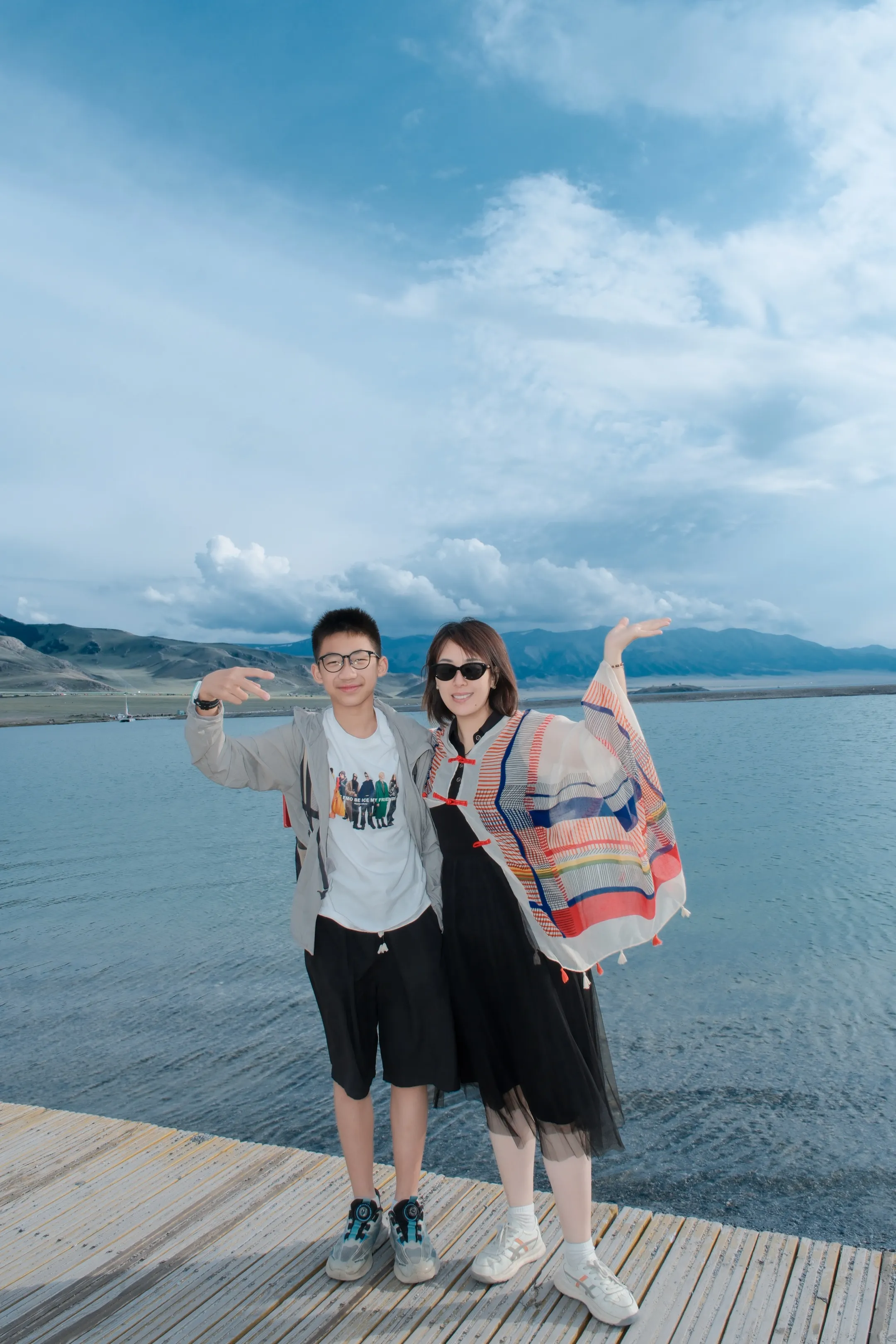 2026.7-A Singaporean mother and her son by Sayram Lake