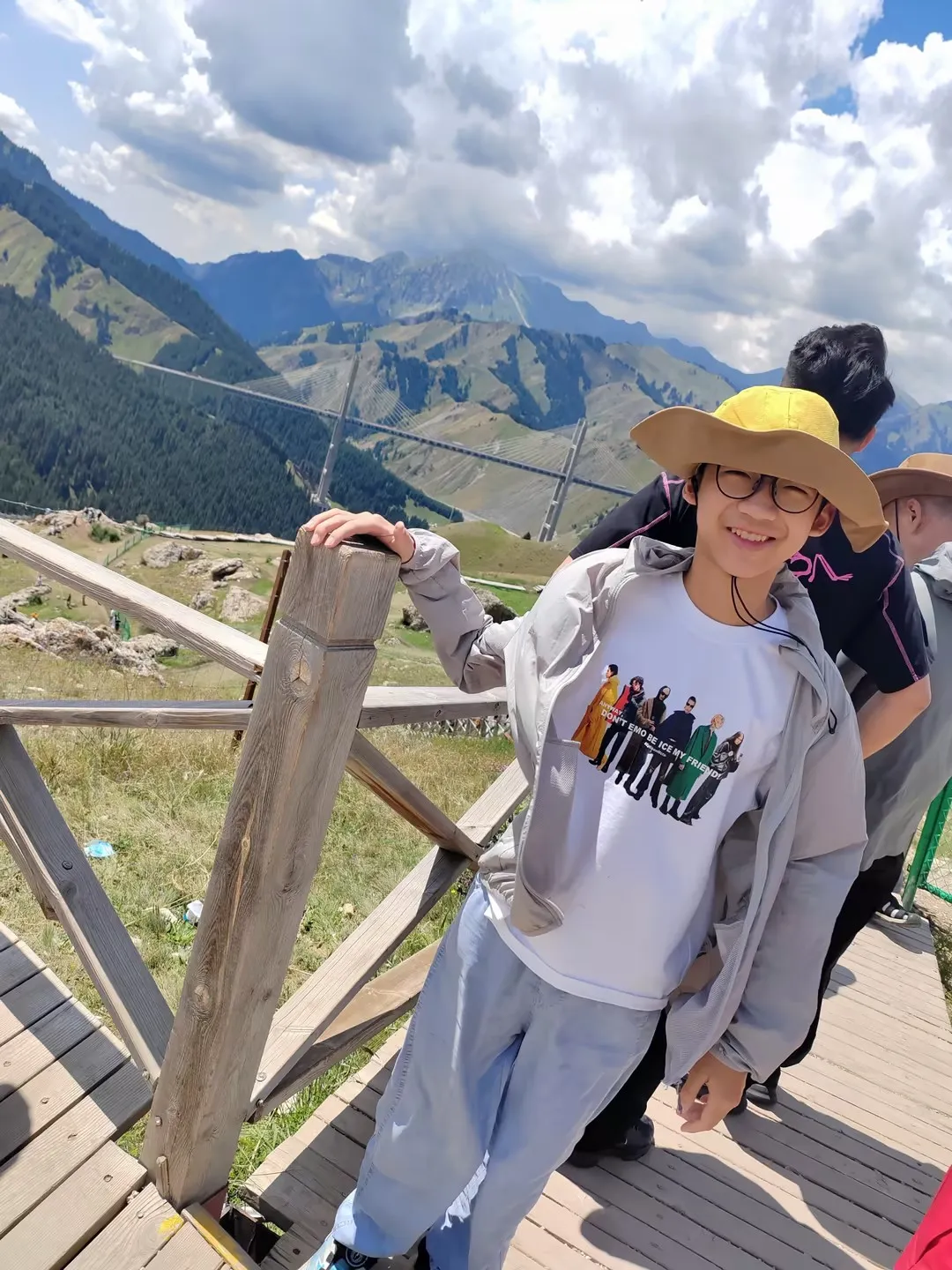 Singaporean tourists climb the mountains by Sayram Lake