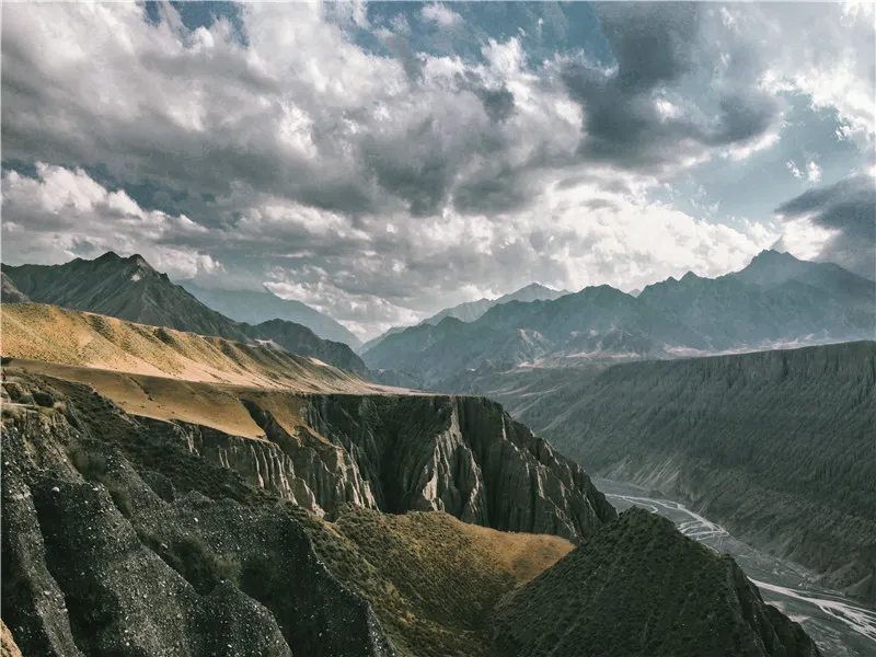 Dushanzi Canyon Stormy Sky Rugged Cliffs in Summer, Xinjiang