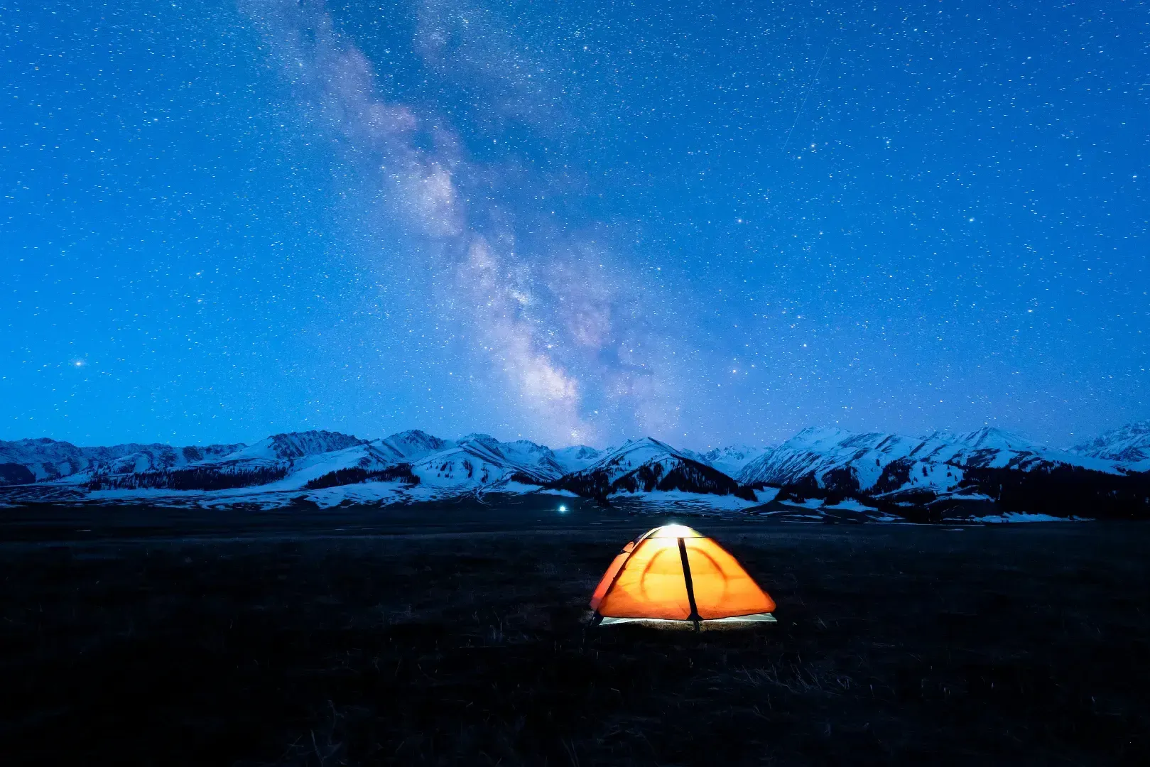 Nalati Grassland glowing yurt beneath the starry night sky, Xinjiang