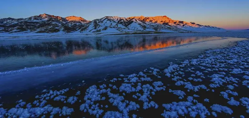 Sayram Lake Golden Snow Ice Reflection in Sunrise, Xinjiang