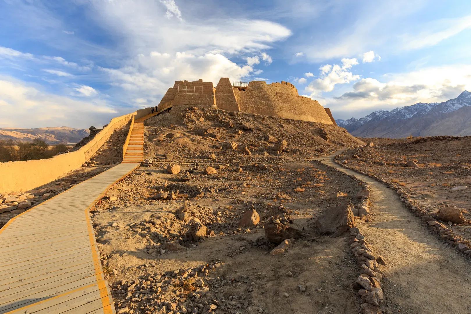 Stone City Ruins Xinjiang boardwalk leading to ancient ruins