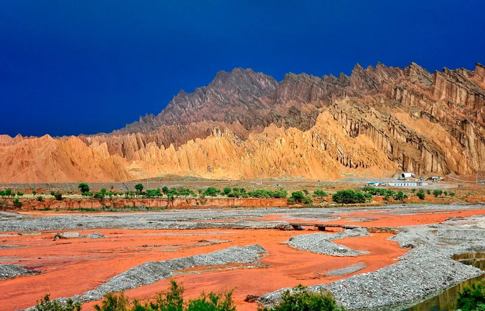 Tianshan Mysterious Grand Canyon Xinjiang red valley panorama with Tianshan mountains